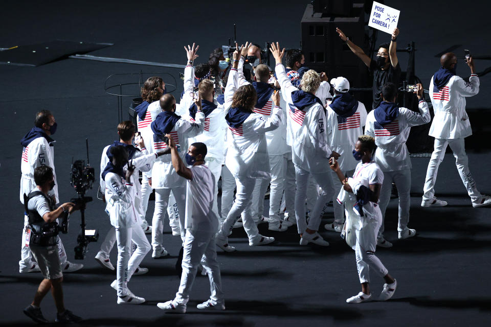 <p>Members of Team United States pose for the host broadcast cameras during the Closing Ceremony of the Tokyo 2020 Olympic Games at Olympic Stadium on August 08, 2021 in Tokyo, Japan. (Photo by Leon Neal/Getty Images)</p> 