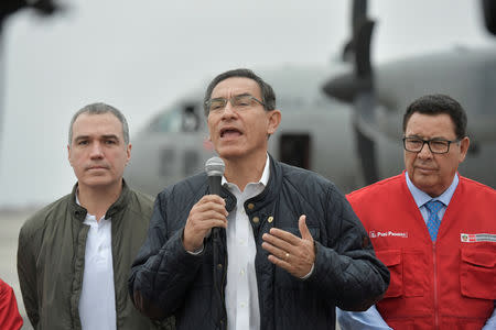 Peru's President Martin Vizcarra accompanied by members of his cabinet speaks to the media before leaving for the area affected by earthquake, at the Jorge Chavez airport in Lima, Peru, May 26, 2019. Freddy Zarco/Courtesy of Bolivian Presidency/Handout via REUTERS
