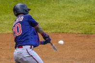 Minnesota Twins' Eddie Rosario hits a grand slam during the third inning of a baseball game against the Milwaukee Brewers Monday, Aug. 10, 2020, in Milwaukee. (AP Photo/Morry Gash)