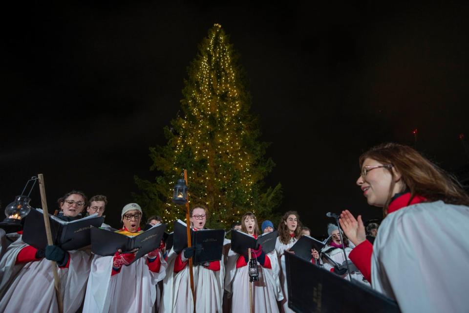 A church choir sing during the annual Norwegian Christmas tree lighting ceremony in Trafalgar Square, in London. (AP)