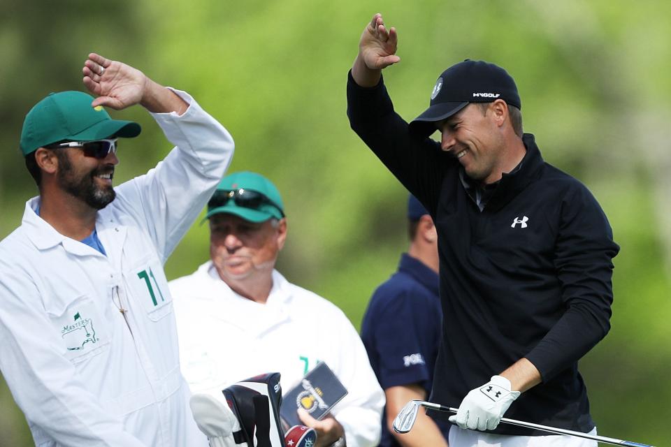 AUGUSTA, GA - APRIL 08:  Jordan Spieth of the United States reacts on the 12th tee with caddie Michael Greller during the final round of the 2018 Masters Tournament at Augusta National Golf Club on April 8, 2018 in Augusta, Georgia.  (Photo by David Cannon/Getty Images)