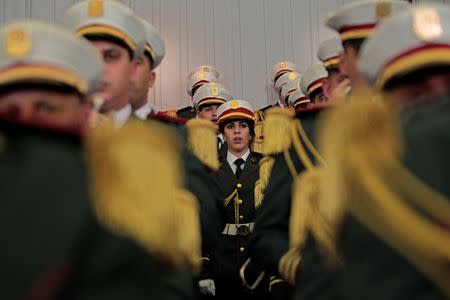 Republican guards sing the national anthem to open the constitutional reforms vote session in Algiers, Algeria February 7, 2016. REUTERS/Ramzi Boudina