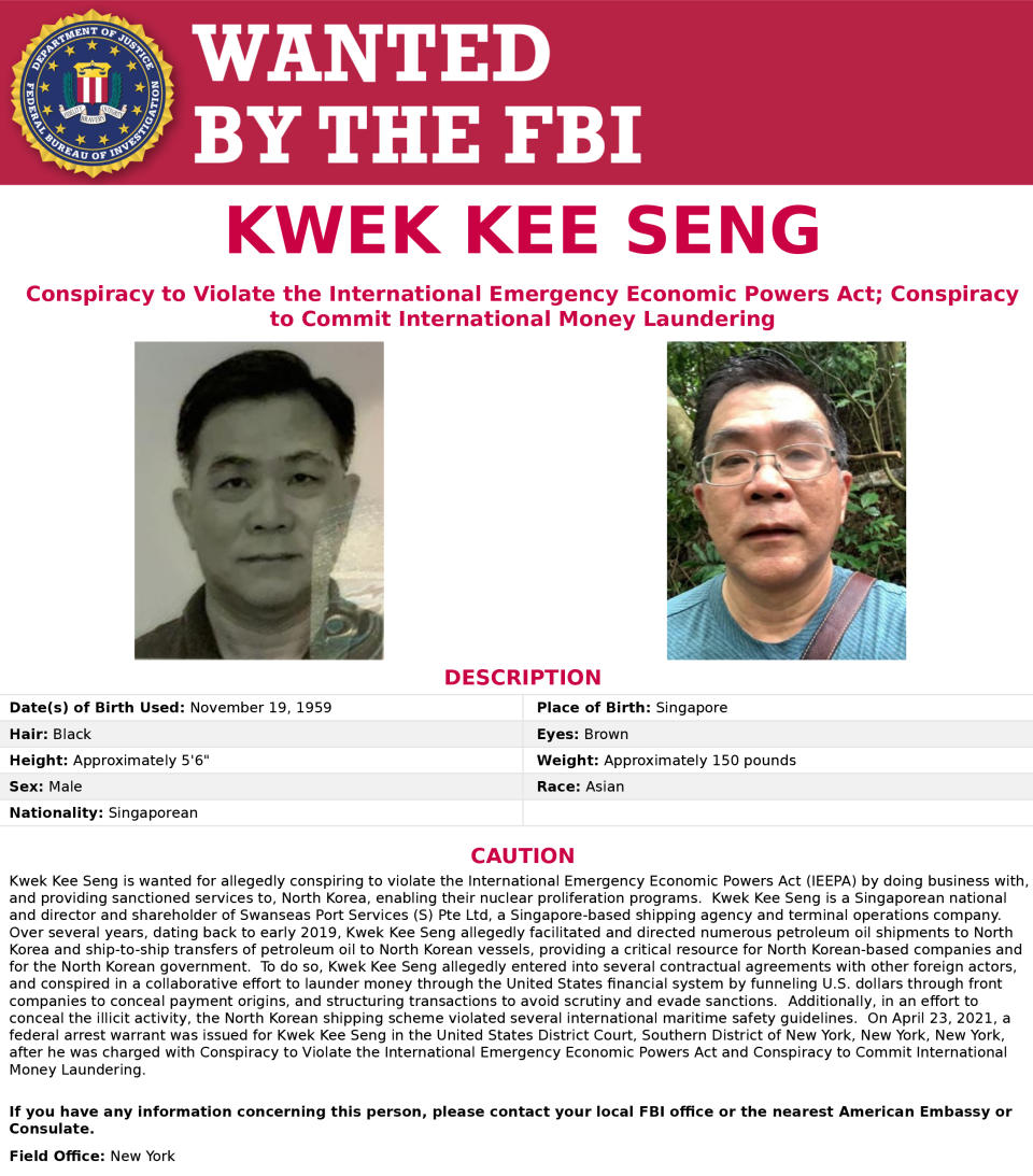 This image released by the FBI shows the wanted poster for Kwek Kee Seng. The Biden administration is offering a reward of up to $5 million for information about a Singapore-based businessman already accused by the Justice Department of facilitating fuel shipments to North Korea in violation of U.N. sanctions. Kwek Kee Seng, who directs a shipping agency and terminal operations company, was charged last year with arranging the deliveries, with prosecutors alleging that he used front companies and false documentation to hide the scheme. Officials say that business helps enable North Korea's nuclear proliferation programs. (FBI via AP)