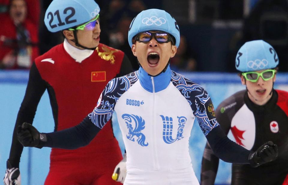 Winner Russia's Victor An celebrates after the men's 500 metres short track speed skating finals event at the Iceberg Skating Palace in the Sochi 2014 Winter Olympic Games February 21, 2014. REUTERS/David Gray