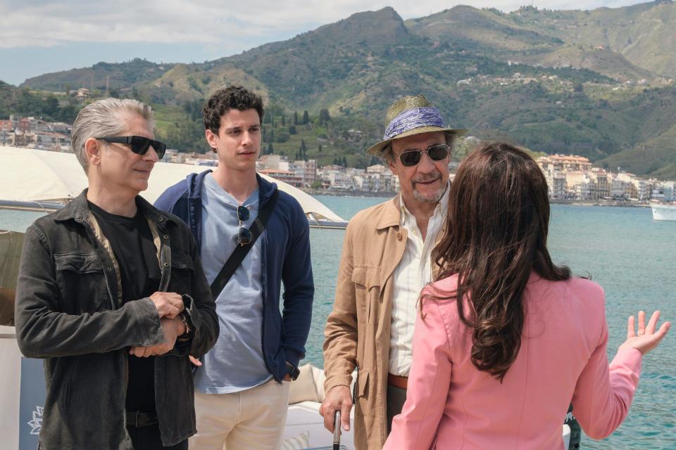 Characters played by Michael Imperioli (left), Adam DiMarco and F. Murray Abraham speak with the general manager of their Sicilian hotel. The trio play three generations of Italian Americans who have arrived to explore their Sicilian roots in the new season of Mike White's "The White Lotus."