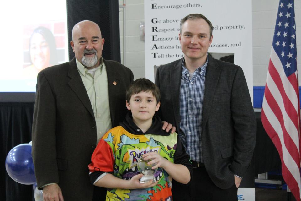 The Boys & Girls Club of Evansville OneMain Financial Unit Youth of the Year winner Alexzander C., with BGCE Executive Director Rob Ryan, and Past President BGCE Sid Dill