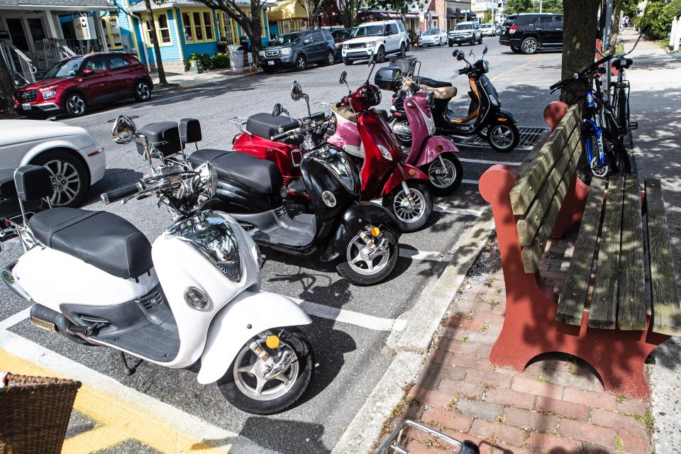 Scooters, bikes, and cars are seen along Baltimore Avenue on Memorial Day weekend at Rehoboth Beach on Saturday, May 27, 2023.