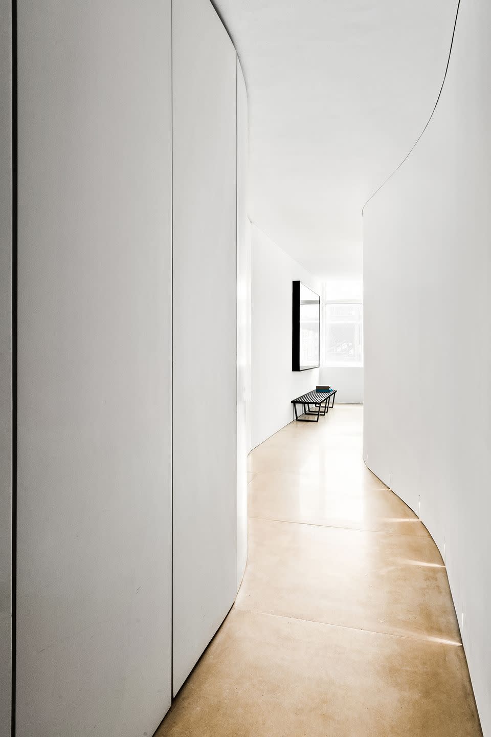 8) The long hallway has hidden floor-to-ceiling storage.