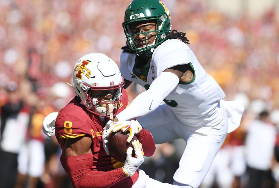 Iowa State wide receiver Xavier Hutchinson (8) catches the ball around Baylor defensive back Mark Milton (3) on Sept. 24. [Nirmalendu Majumdar/Ames Tribune-USA TODAY Sports]