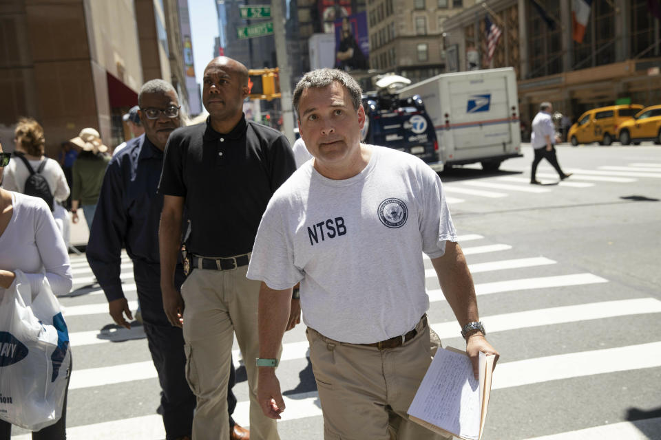 Doug Brazy, an investigator with the National Transportation Safety Board, arrives for a news conference, Tuesday, June 11, 2019 in New York. He gave an update on Monday's helicopter crash on the roof of a rain-shrouded Manhattan skyscraper, which killed the pilot, Tim McCormack, of Clinton Corners, N.Y. (AP Photo/Mark Lennihan)