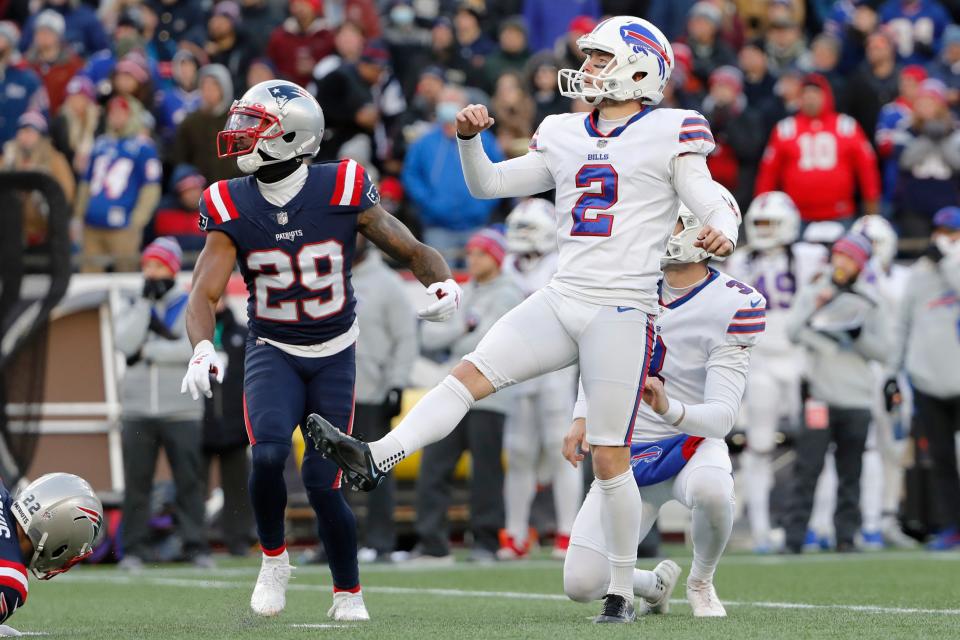 Patriots core special-teamer Justin Bethel, left, watches as Bills kicker Tyler Bass kicks a field goal during a game in December. Bethel, a three-time Pro Bowler, was cut by New England on Tuesday as the team got down to the mandatory 53-man roster.