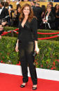 <p>While technically a jumpsuit, Julia Roberts’ Givenchy look still looks like a suit — a sexy one at that!</p>