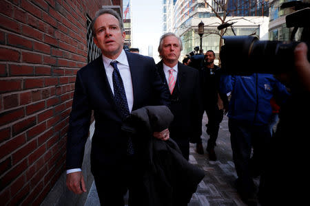 Gordon Ernst, Georgetown University's former head tennis coach facing charges in a nationwide college admissions cheating scheme, leaves the federal courthouse in Boston, Massachusetts, U.S., March 25, 2019. REUTERS/Brian Snyder