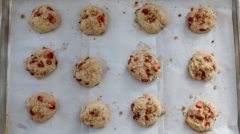 baked strawberry shortcake crumble cookies on a baking sheet