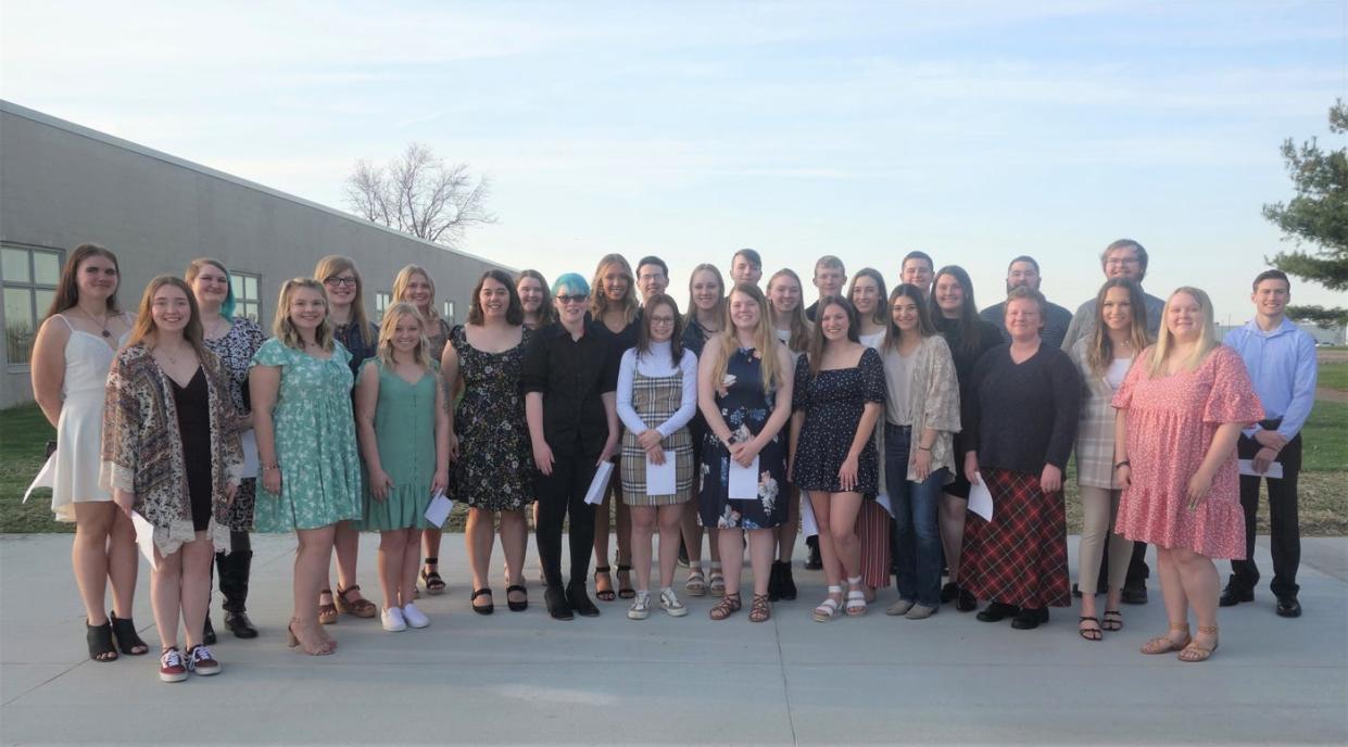 New Phi Theta Kappa inductees poses for a photo.