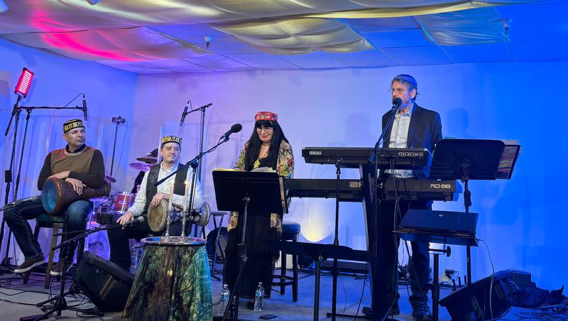 The House of Prayers for All Peoples held a music-filled Kabbalat Shabbat service on Friday, Feb. 9, 2024. Rabbi Alan Scott Bachman, right, gave his sermon while playing the keyboard alongside Rebbetzin Andalin Shekinah on the flute and vocals, Ricardo Romero on drums and Bryan Bale on percussion. The group also invited business professor Promothesh Chatterjee to give a lecture on Hindu teachings.