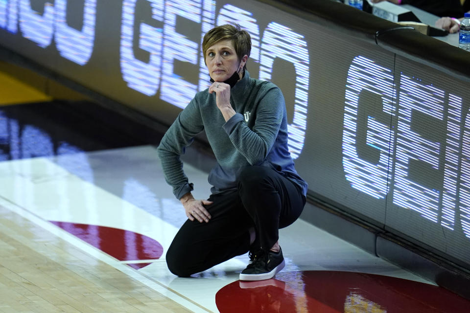 FILE - Indiana head coach Teri Moren looks on during the first half of an NCAA college basketball game against Maryland in College Park, Md., in this Monday, Jan. 4, 2021, file photo. This week, No. 9 Indiana begins a new quest — dethroning No. 7 Maryland as tourney champs in Indianapolis. (AP Photo/Julio Cortez, File)