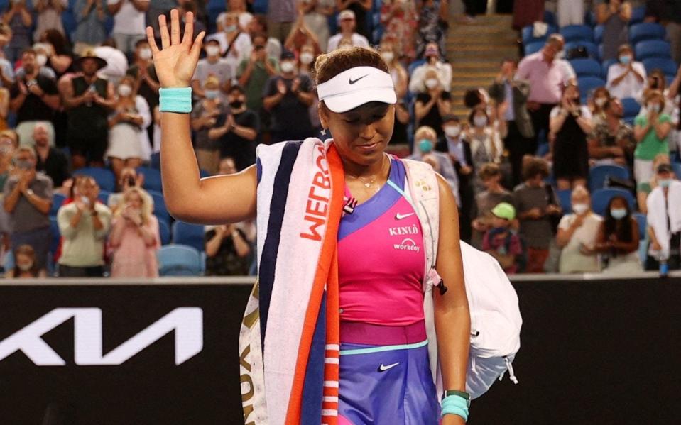 Japan's Naomi Osaka waves to the crowd after losing her third-round match - Naomi Osaka philosophical and happy in defeat thanks to campaign of self-improvement - REUTERS