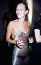 <p>Kate Moss’s 1993 transparent slip dress - ICONIC.<i> [Photo: REX]</i></p>