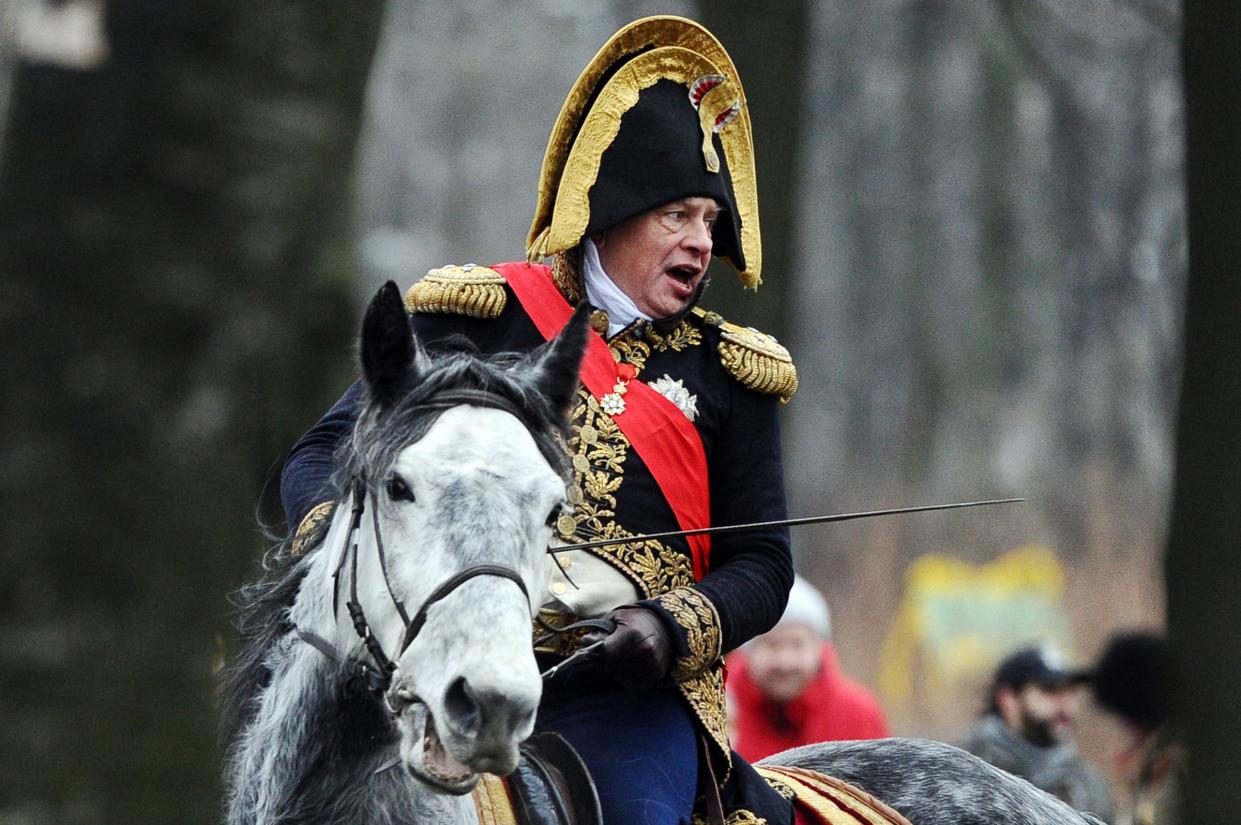 A picture taken on January 7, 2014, shows Paris Sorbonne University's professor Oleg Sokolov giving orders to his troops during a reenactment of the 1812 war in Saint Petersburg.