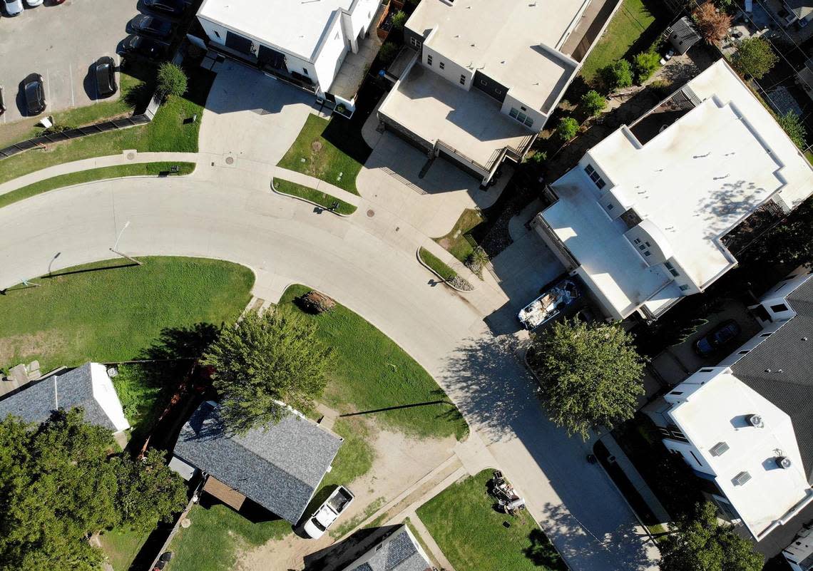 Debris sits outside of residences on Templeton Drive in the Linwood neighborhood of Fort Worth on Monday, September 26, 2022. Areas around the Cultural District and West 7th Street are identified as city flood risk areas on new flood maps the city is developing.