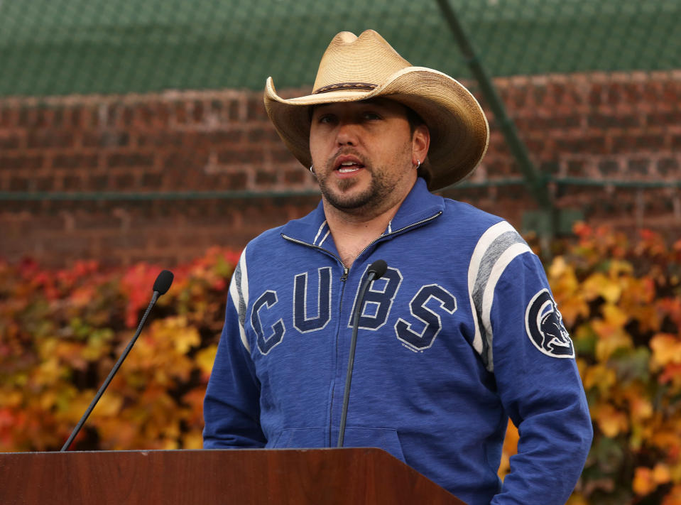 Country singer Jason Aldean speaks during a news conference at Wrigley Field to announce his 2013 Night Train Tour on Thursday, Oct. 18, 2012, in Chicago. (Photo by Barry Brecheisen/Invision/AP)