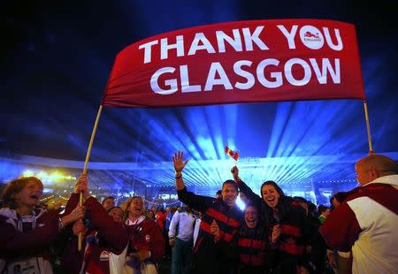 Canadian athletes wave during the closing ceremony of the 2014 commonwealth games at Hampden Park in Glasgow, Scotland August 3, 2014. REUTERS/Jim Young