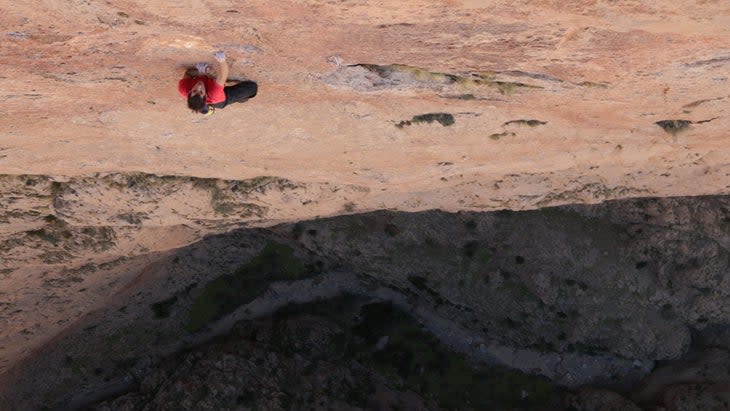 <span class="article__caption">Alex Honnold <a href="https://www.climbing.com/people/the-story-of-alex-honnolds-riviere-pourpres-5-12c-free-solo-in-the-taghia-gorge/?utm_campaign=discover_rss&utm_source=yahoo&utm_medium=CLIMBING" rel="nofollow noopener" target="_blank" data-ylk="slk:free soloing Les Rivieres Pourpres;elm:context_link;itc:0;sec:content-canvas" class="link ">free soloing Les Rivieres Pourpres</a> (5.12c, 1,800 feet). In hindsight, he later admitted, he probably should have rehearsed it a bit more.</span> (Photo: National Geographic)