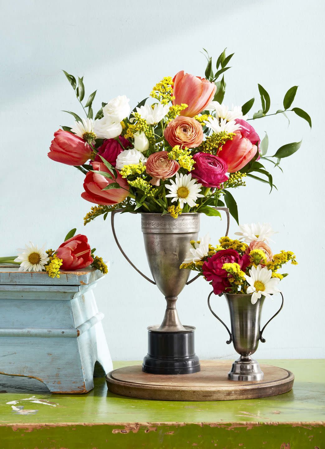 kentucky derby party floral arrangements in vintage trophies