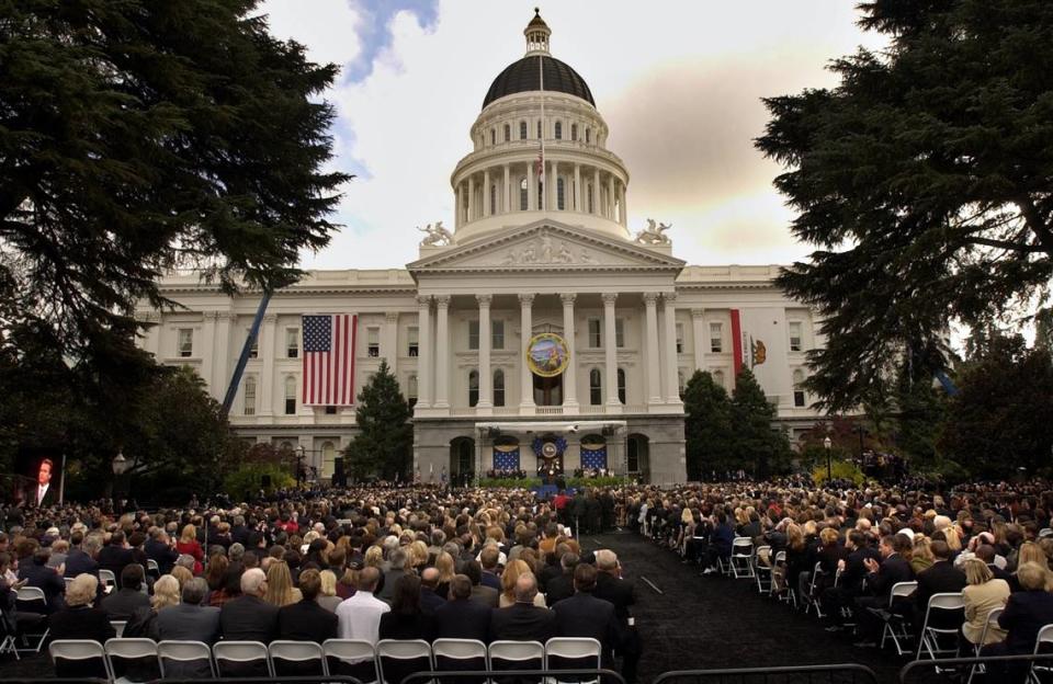 Guests watch the swearing in of Gov. Arnold Schwarzenegger at the state Capitol on Nov. 17, 2003.