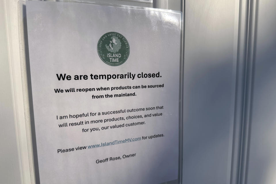 A closed sign is attached to the door of the Island Time cannabis dispensary, June 3, 2024, in Vineyard Haven, Mass. Unless something changes, Martha's Vineyard is about to run out of pot, affecting more than 230 registered medical users and thousands more recreational ones. (AP Photo/Nick Perry)