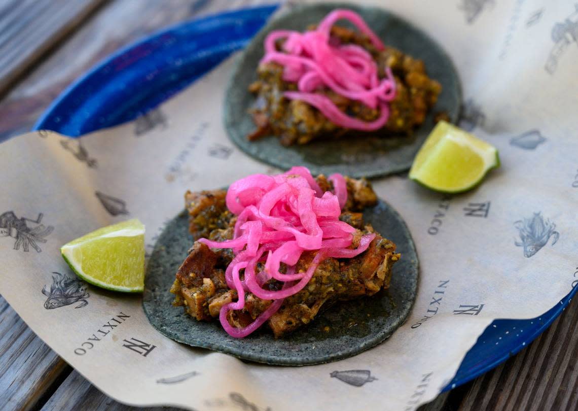 A chicharron taco at Nixtaco in Roseville is made July 2, 2019, with pork belly in a great sauce with lime-pickled onions in a homemade tortilla.