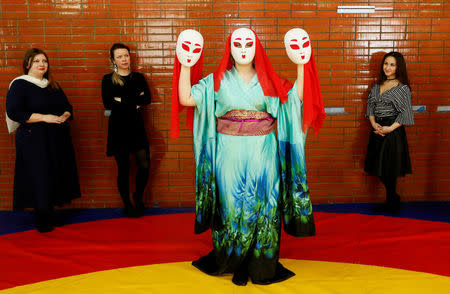 Galina Tiptsova, a student, who is also a model of the SibPlus Models agency and a participant of the Miss Doughnut beauty competition, demonstrates a Japanese traditional dance during a rehearsal in Krasnoyarsk, Siberia, Russia March 5, 2017. REUTERS/Ilya Naymushin