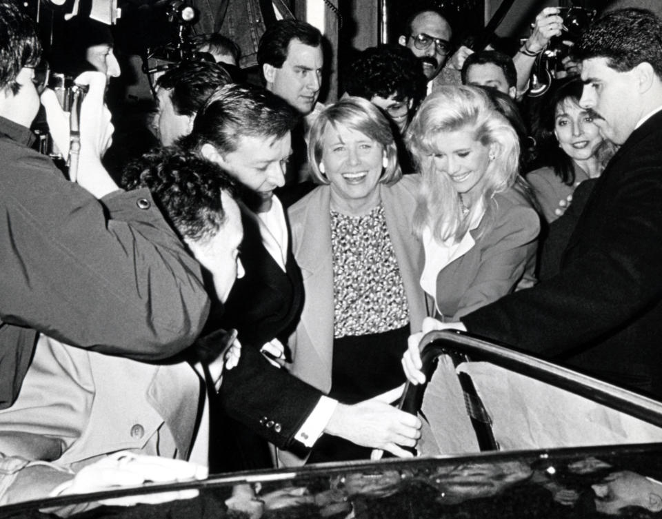 Smith took sides -- Ivana's -- in the Trump's 1990 divorce. Here, they were mobbed by press on the way to a birthday lunch for Ivana just after the divorce was announced. (Photo: Getty Images)