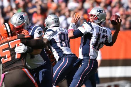 Oct 9, 2016; Cleveland, OH, USA; New England Patriots quarterback Tom Brady (12) throws a pass during the second quarter at FirstEnergy Stadium. Mandatory Credit: Ken Blaze-USA TODAY Sports