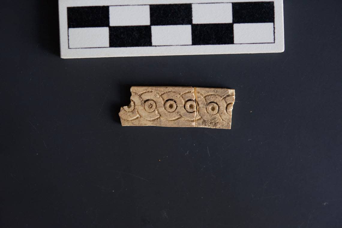 A piece of carved ivory found at the palace.