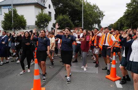Students perform the Haka during a vigil to commemorate victims of Friday's shooting, outside Masjid Al Noor mosque in Christchurch, New Zealand March 18, 2019. REUTERS/Jorge Silva