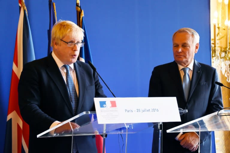 French Foreign Minister Jean Marc Ayrault (R) and Britain's Foreign Minister Boris Johnson (L), hold a joint press conference following their meeting at the ministry in Paris, on July 28, 2016