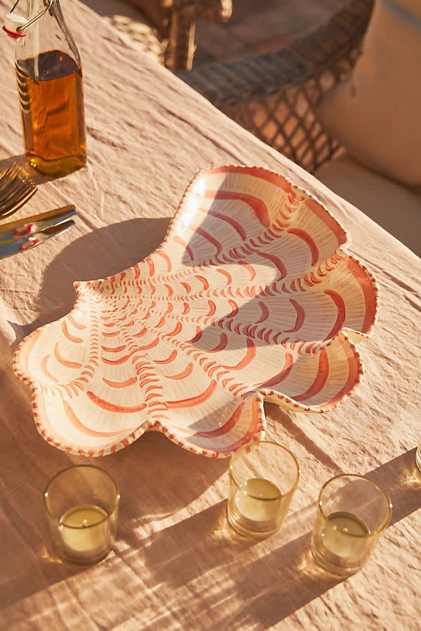 <p><a href="https://go.redirectingat.com?id=74968X1596630&url=https%3A%2F%2Fwww.anthropologie.com%2Fanthroliving%2Fshop%2Flucie-de-moyencourt-platter%3Fcolor%3D067%26size%3DS&sref=https%3A%2F%2Fwww.delish.com%2Ffood-news%2Fa44375386%2Ftomato-girl-summer-tiktok-fashion%2F" rel="nofollow noopener" target="_blank" data-ylk="slk:Shop Now;elm:context_link;itc:0;sec:content-canvas" class="link ">Shop Now</a></p><p>Lucie de Moyencourt Platter By Lucie de Moyencourt in Orange Size S</p><p>$52.80</p><p>anthropologie.com</p>