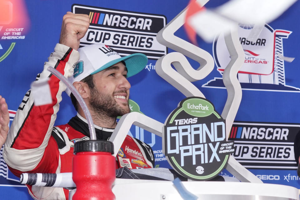 Chase Elliott celebrates in Victory Lane after winning a NASCAR Cup Series auto race at Circuit of the Americas in Austin, Texas, Sunday, May 23, 2021. (AP Photo/Chuck Burton)