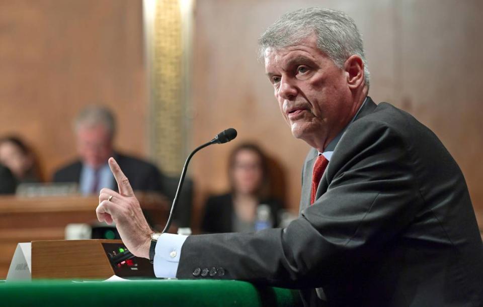 Former Wells Fargo CEO Tim Sloan testified before the Senate banking committee during his time at the bank. He is suing Wells Fargo for $34 million for compensation.