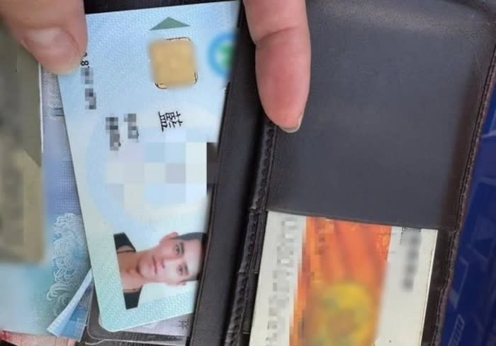 The pedestrian shows the ID card inside the wallet