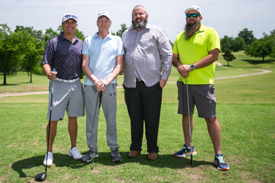 Tim Bench (second from left) is pictured with his golfing buddies at Surrey Hills Golf Course on May 11.