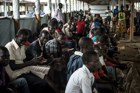South Sudanese people wait to be registered as refugees at the Imvepi refugee settlement camp in Arua District, northern Uganda August 13, 2017. REUTERS/Jason Patinkin