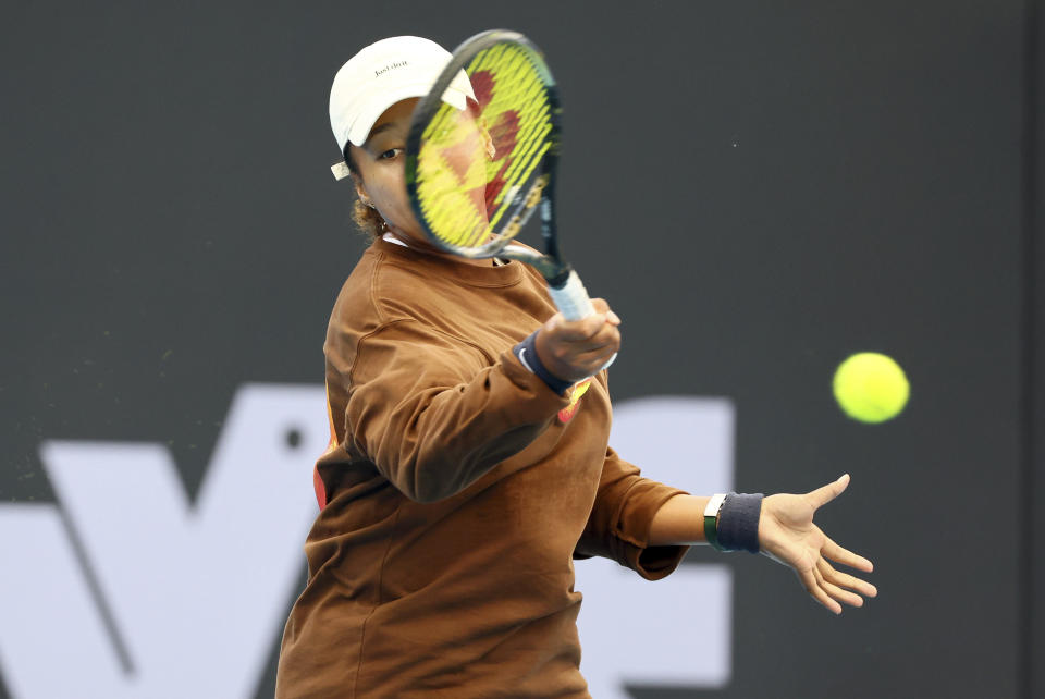 Naomi Osaka of Japan practices during a training session ahead of the Brisbane International tennis tournament in Brisbane, Australia, Wednesday, Dec. 27, 2023. (AP Photo/Tertius Pickard)