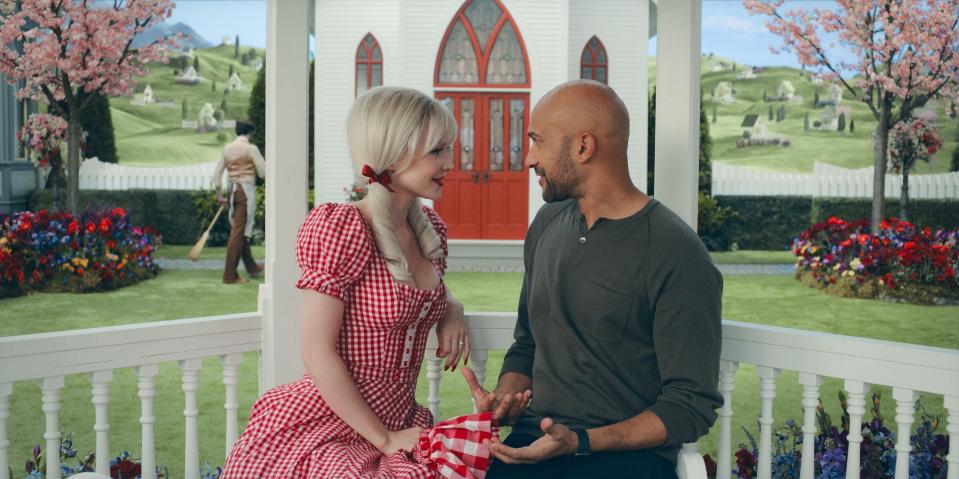 Josh and a love interest sit in a gazebo