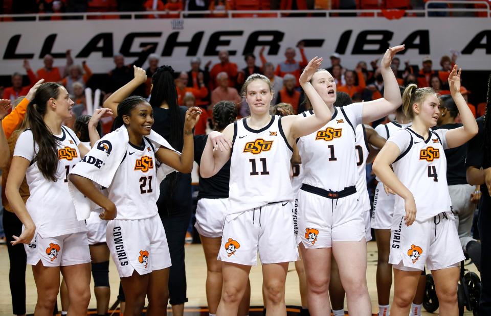 Oklahoma State sing the alma mater following the college women's basketball game between the Oklahoma State Cowgirls and the TCU Horned Frogs at Gallagher-Iba Arena in Stillwater, Okla., Saturday, Jan.14, 2023. 