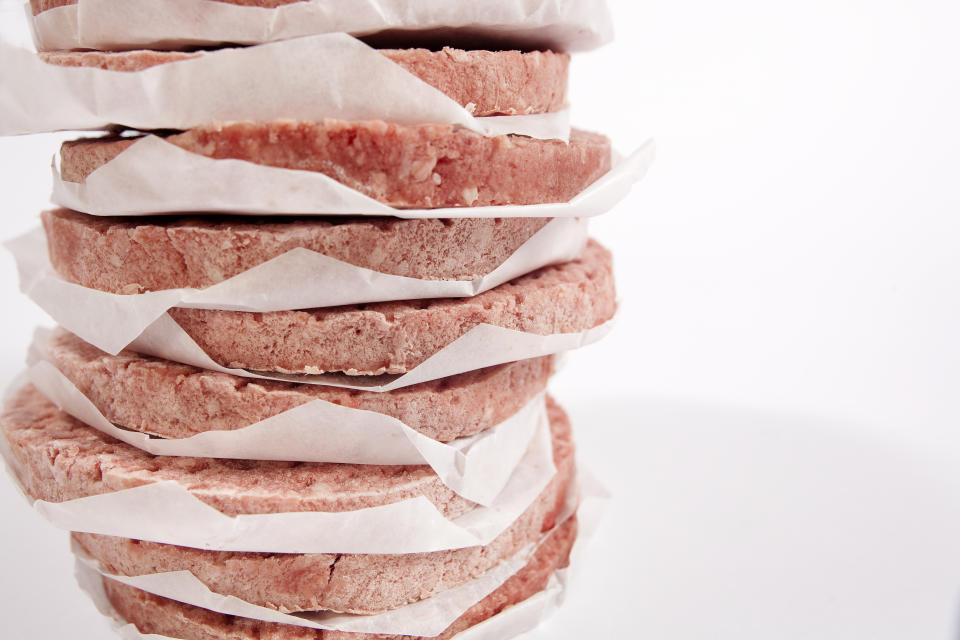 frozen burger patties with paper in between