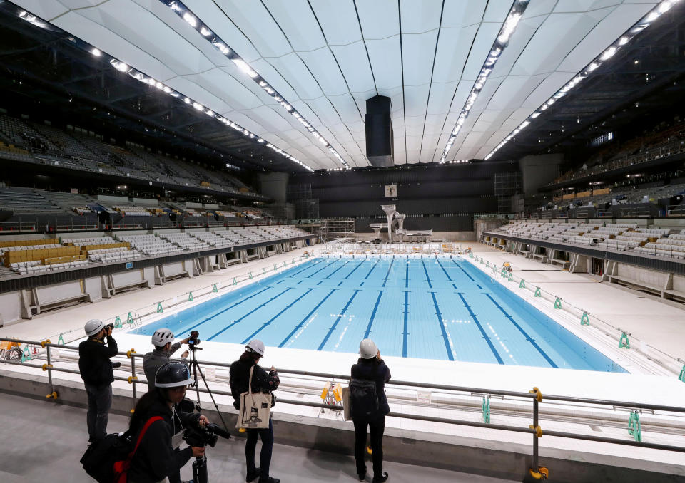 In this Nov. 21, 2019, photo, Tokyo Aquatics Center, a venue for swimming and diving at the Tokyo 2020 Summer Olympics, is seen in Tokyo. (Yukie Nishizawa/Kyodo News via AP)