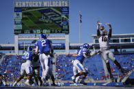 CORRECTS TO GEORGIA DEFENSIVE LINEMAN MALIK HERRING- Georgia defensive lineman Malik Herring (10) blocks the pass of Kentucky quarterback Joey Gatewood (2) during the first half an NCAA college football game, Oct. 31, 2020, in Lexington, Ky. (AP Photo/Bryan Woolston)